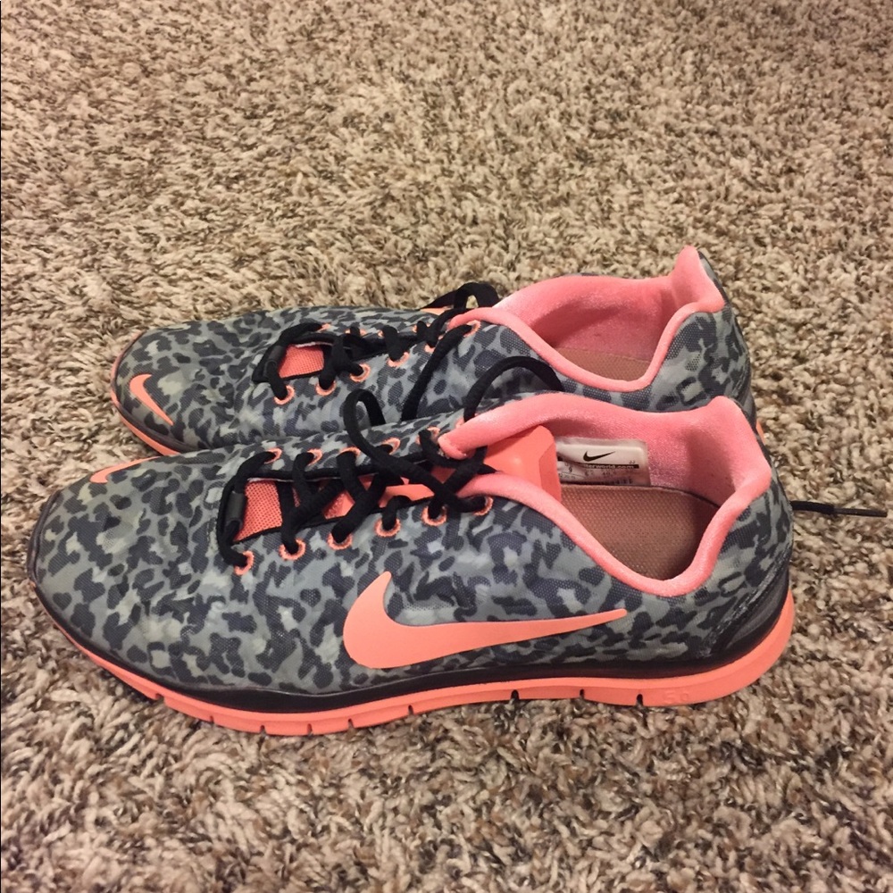 Animal print and pink nike shoes